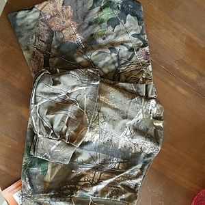 Two men's camouflage shirts